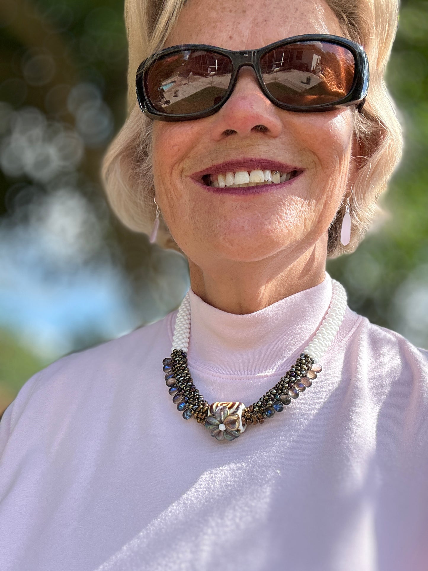 Whispering Bloom Beaded Necklace — Elegant Floral Accent with Pearl White and Bronze Beads
