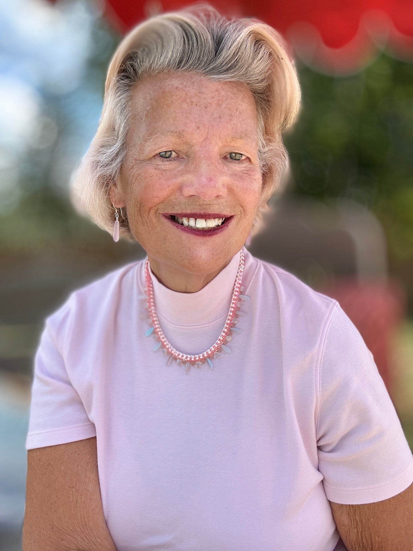 Delicate Pink Beaded Necklace with Iridescent Drop Accents