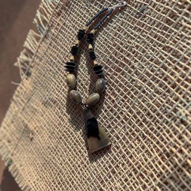 Hand-Beaded African Statement Necklace – Natural Wood & Horn Pendant